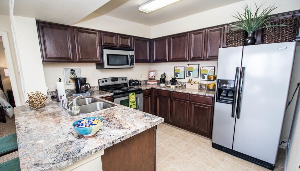 Fully equipped kitchen at Tuscany Place in Lubbock, Texas