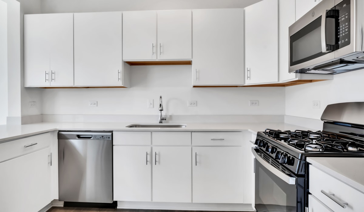 Kitchen with stainless-steel appliances at Home at Ashcroft in Oswego, Illinois