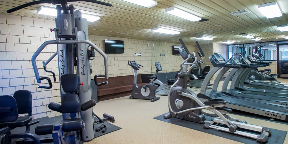 Fully equipped fitness center at Sunchase Apartments in Tulsa, Oklahoma