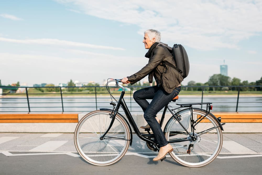 Resident cycling to a restaurant near Villa Encantada in San Diego, California