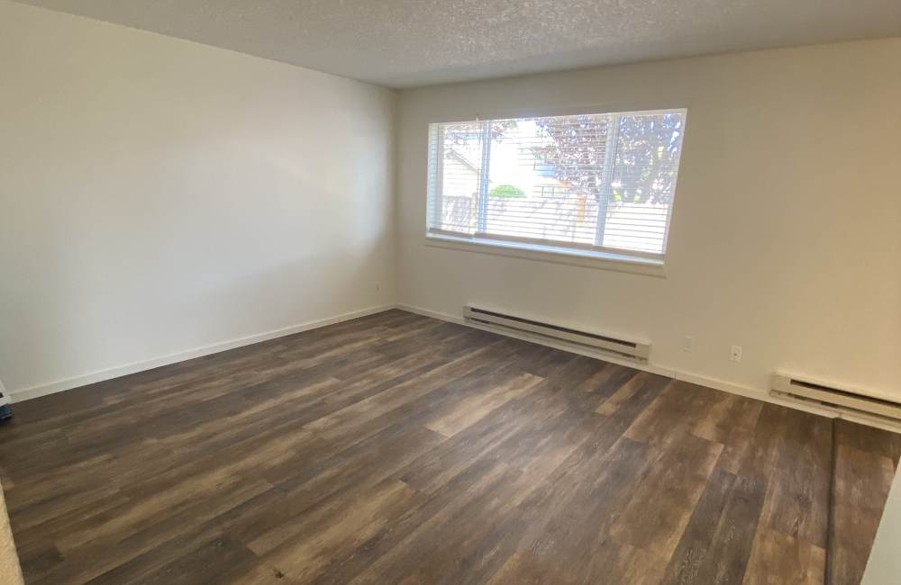 Bedroom with wood-style floors at Parkside Apartments