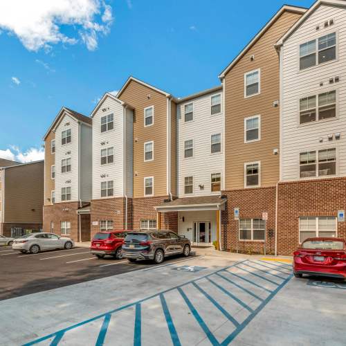 Exterior view and parking at Magnolia Greene in Lavale, Maryland