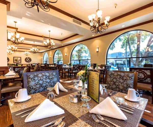 Large indoor dining area at Pacifica Senior Living San Leandro in San Leandro, California
