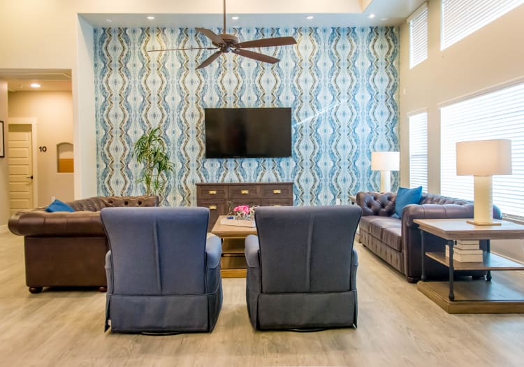 Living room with TV at Hacienda Del Rey in Litchfield Park, Arizona