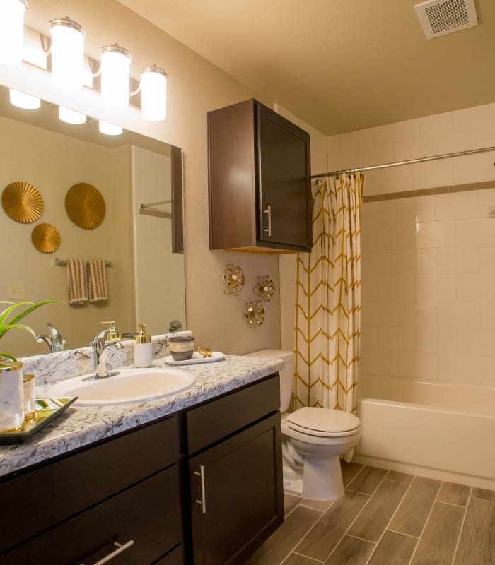 Bathroom with tile flooring at Icon at Broken Arrow in Broken Arrow, Oklahoma