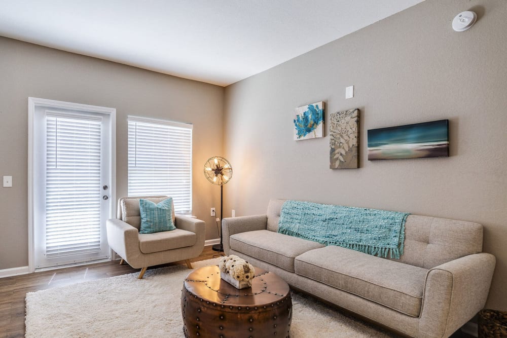Living room with white couch at Westshore Palms in Panama City, Florida