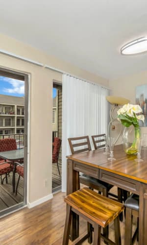 Dining nook with a patio view at Rivercrest in Waco, Texas