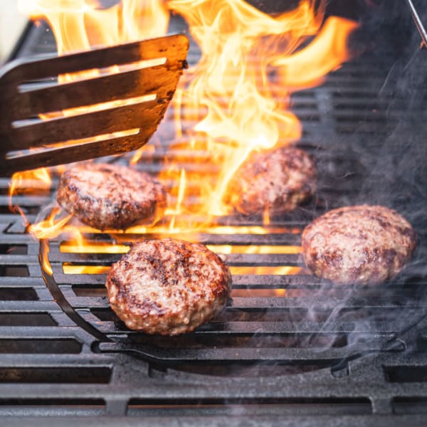 A resident barbeques at Promenade Pointe, Norfolk, Virginia