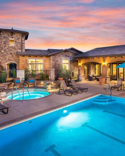Swimming pool and hot tub at Hollister Village Apartment Homes, Goleta, California