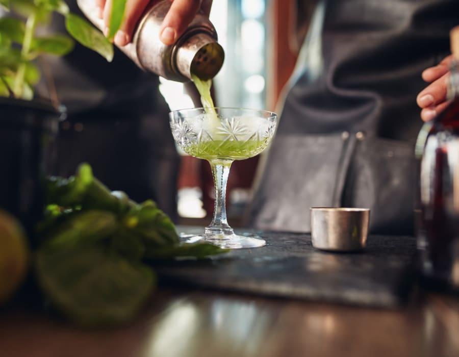 A mixed drink being poured at Lumen Briarcliff in Atlanta, Georgia