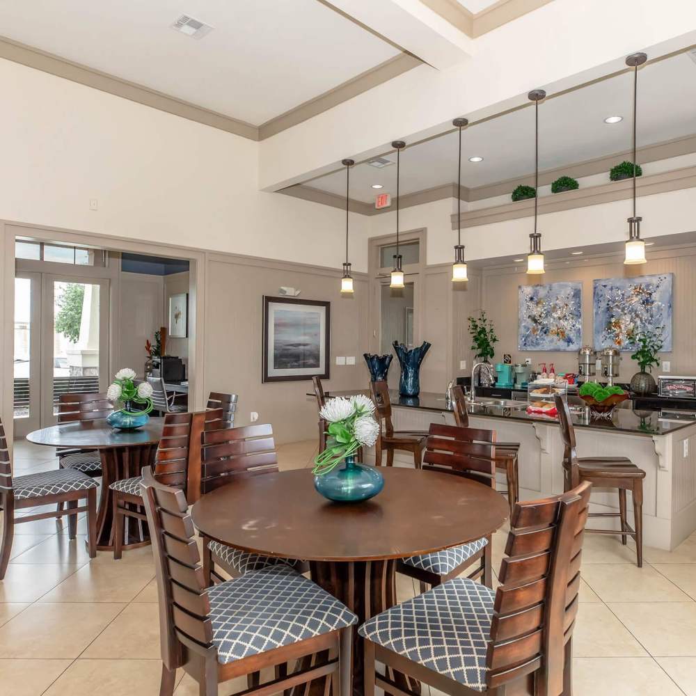 Community kitchen and dinning area at Aria Victoria Apartments in Victoria, Texas