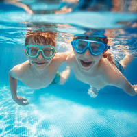 Rendering of residents in swimming pool at Belmont Place in Round Rock, Texas