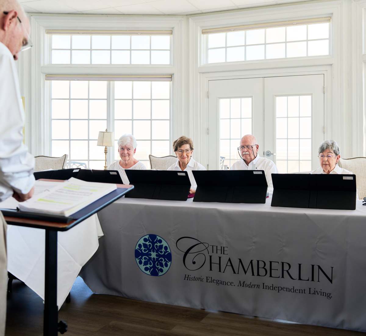 Residents socializing at The Chamberlin in Hampton, Virginia