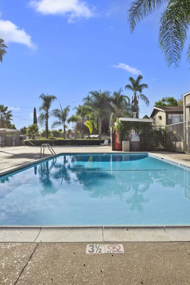 Pool area  at Tribeca Apartments in Azusa, California