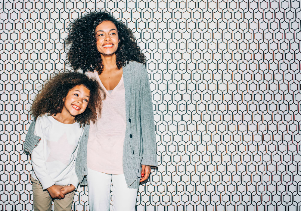 Resident mother and daughter posing for a photo at Sofi Irvine in Irvine, California