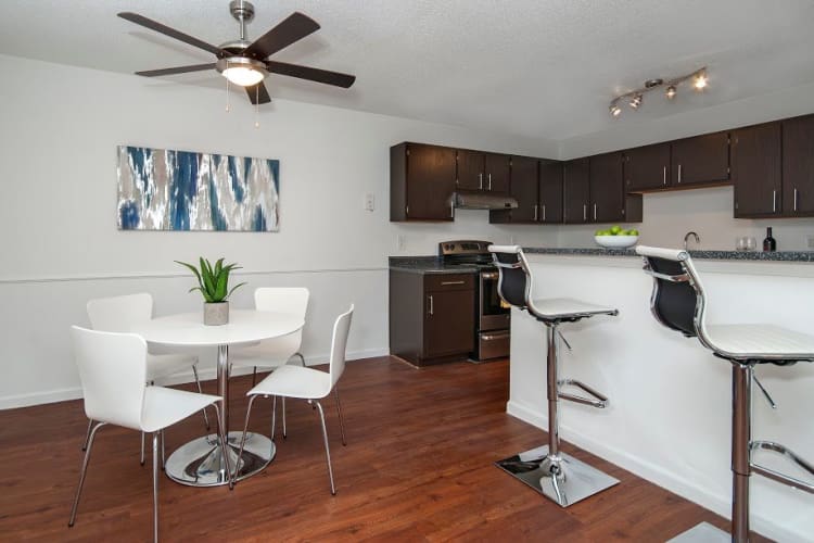 Dining area and kitchen at The Enclave
