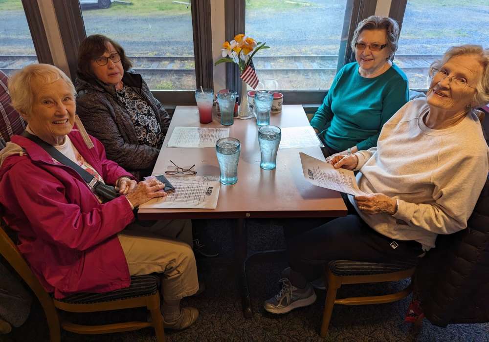 Residents having lunch at Merrill Gardens at Tacoma in Tacoma, Washington