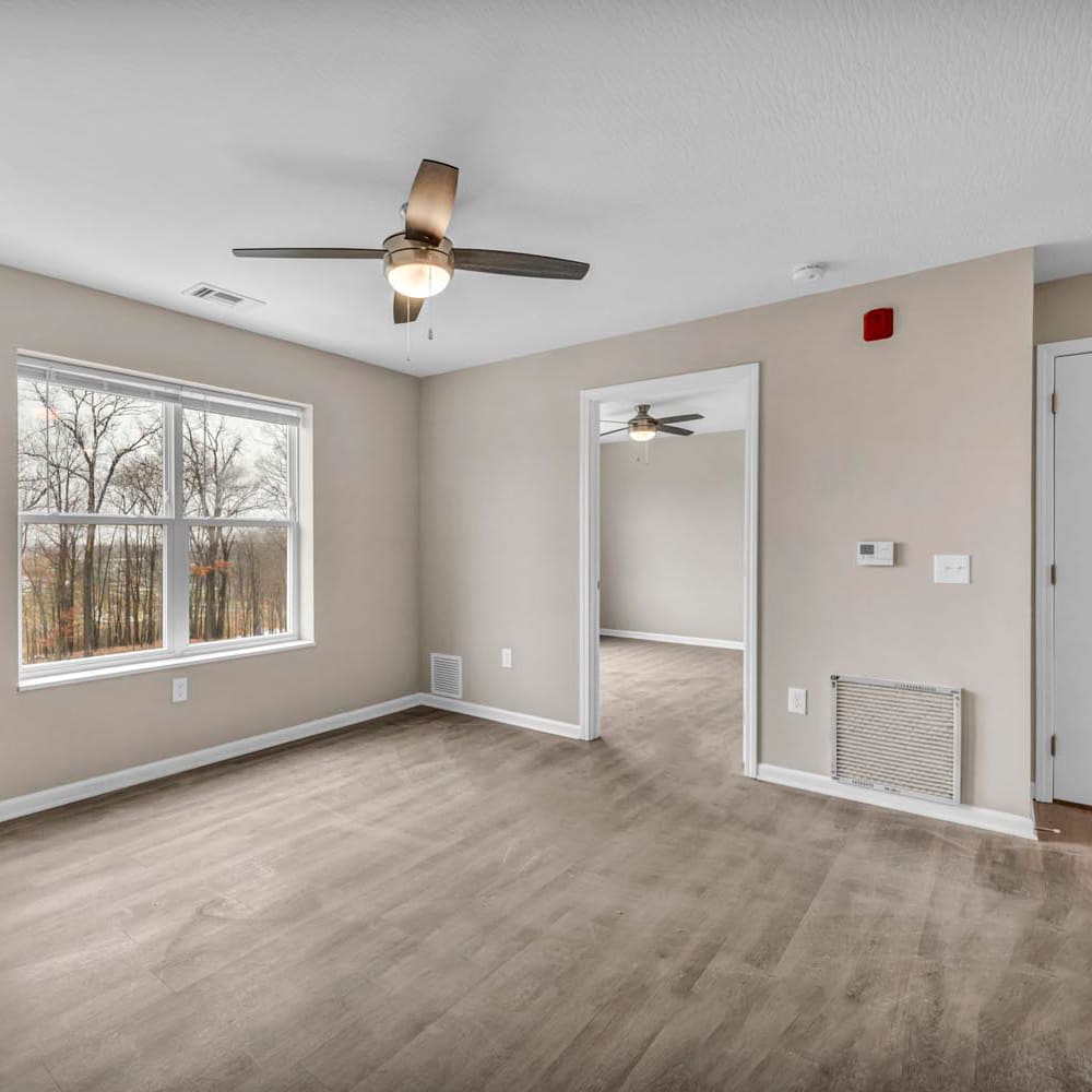 Light brown flooring with ceiling fan at Chesterfield Terrace in Parma, Ohio