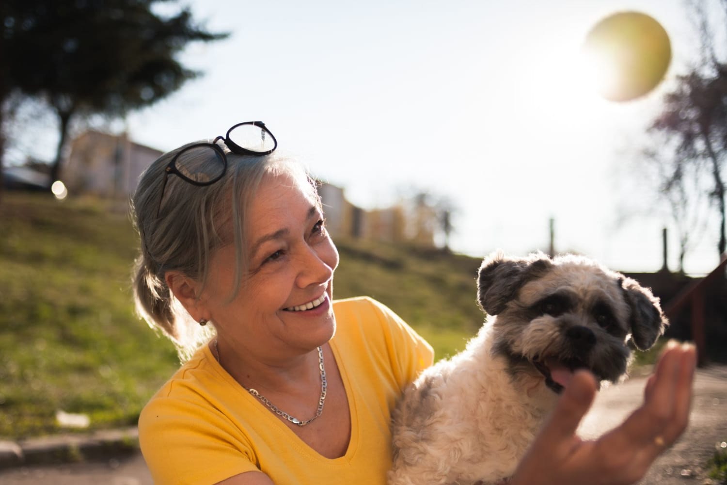 Happy owner with her dog at Valley Pride Village in Sylmar, California