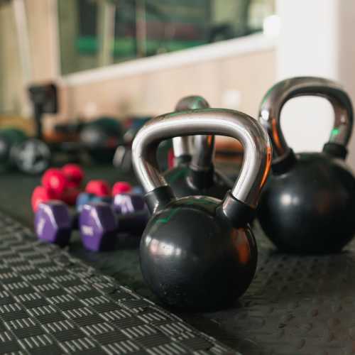 Kettle bells and dumbbells in fitness center at Oakmont Greene II in Mount Hope, West Virginia
