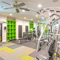 Fitness center with workout facilities at Prairie Pines in Shawnee, Kansas