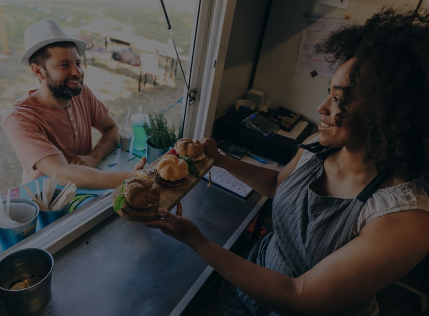 Resident getting some tasty grub at the 808 Grinds food cart near Brooklyn Yard in Portland, Oregon