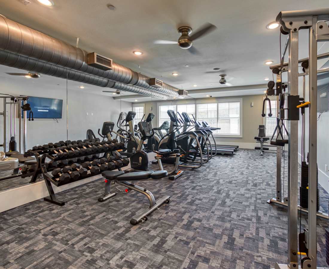 Fitness center at Milwee Street Apartments in Houston, Texas