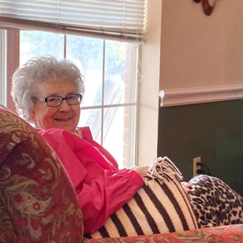 Resident sitting by a window at Canoe Brook Assisted Living in Duncan, Oklahoma