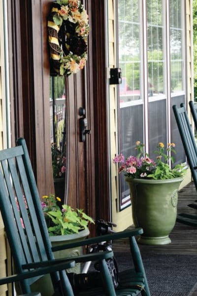 Patio with chairs lined up at Quail Park of Granbury in Granbury, Texas
