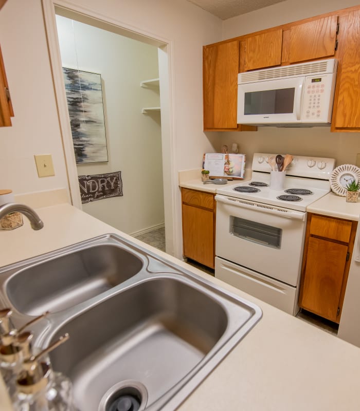 Kitchen with granite countertops at Newport Apartments in Amarillo, Texas