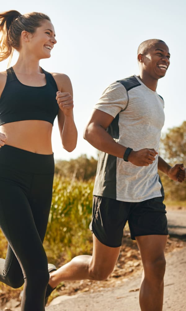 Residents on a running together in Raleigh, North Carolina near UNCOMMON Raleigh