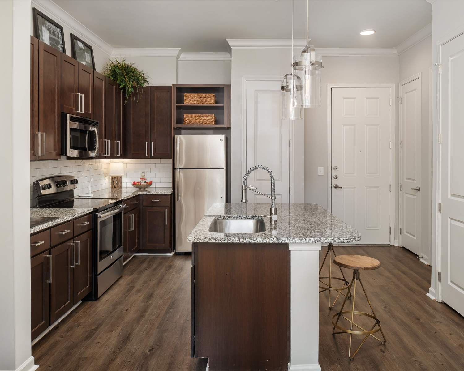 Granite countertop with bar stools at Ardmore & Twenty Eighth in Atlanta, Georgia 