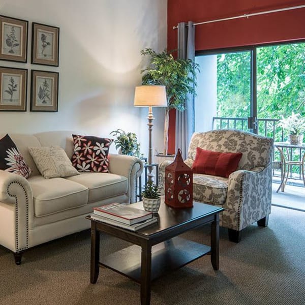 Stunning model living room with a private balcony at Pasadena Highlands in Pasadena, California
