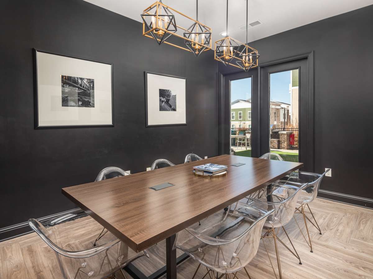 Modern black walls with a wooden table and clear at Ardmore & Twenty Eighth in Atlanta, Georgia