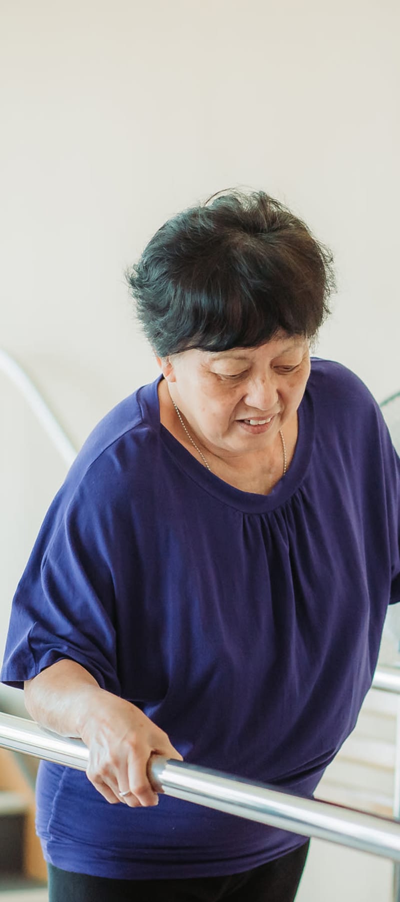 Resident working with a physical therapist on walking at Edgerton Care Center in Edgerton, Wisconsin