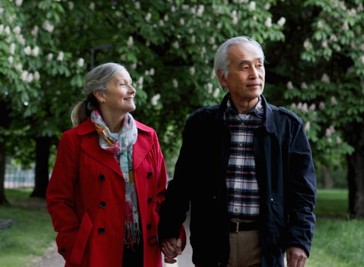 A couple on an evening stroll at Parkside of Livonia in Livonia, Michigan