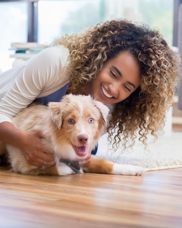 Happy owner with her dog at  Parallel 36 at Legacy in Opelika, Alabama