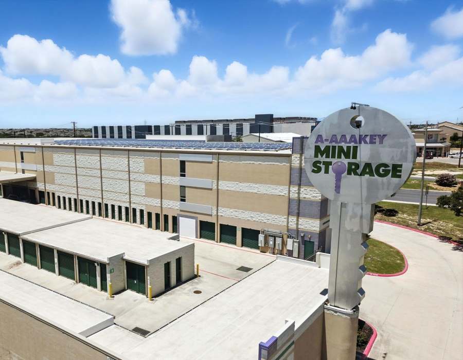 Clients locking the shutter at Storage Hub - Military in San Antonio, Texas