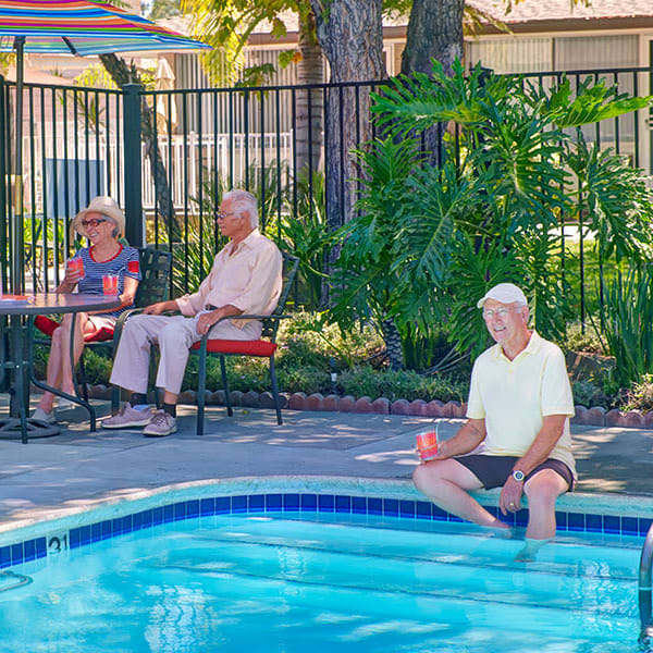 Residents enjoying the pool at Monte Vista Village in Lemon Grove, California