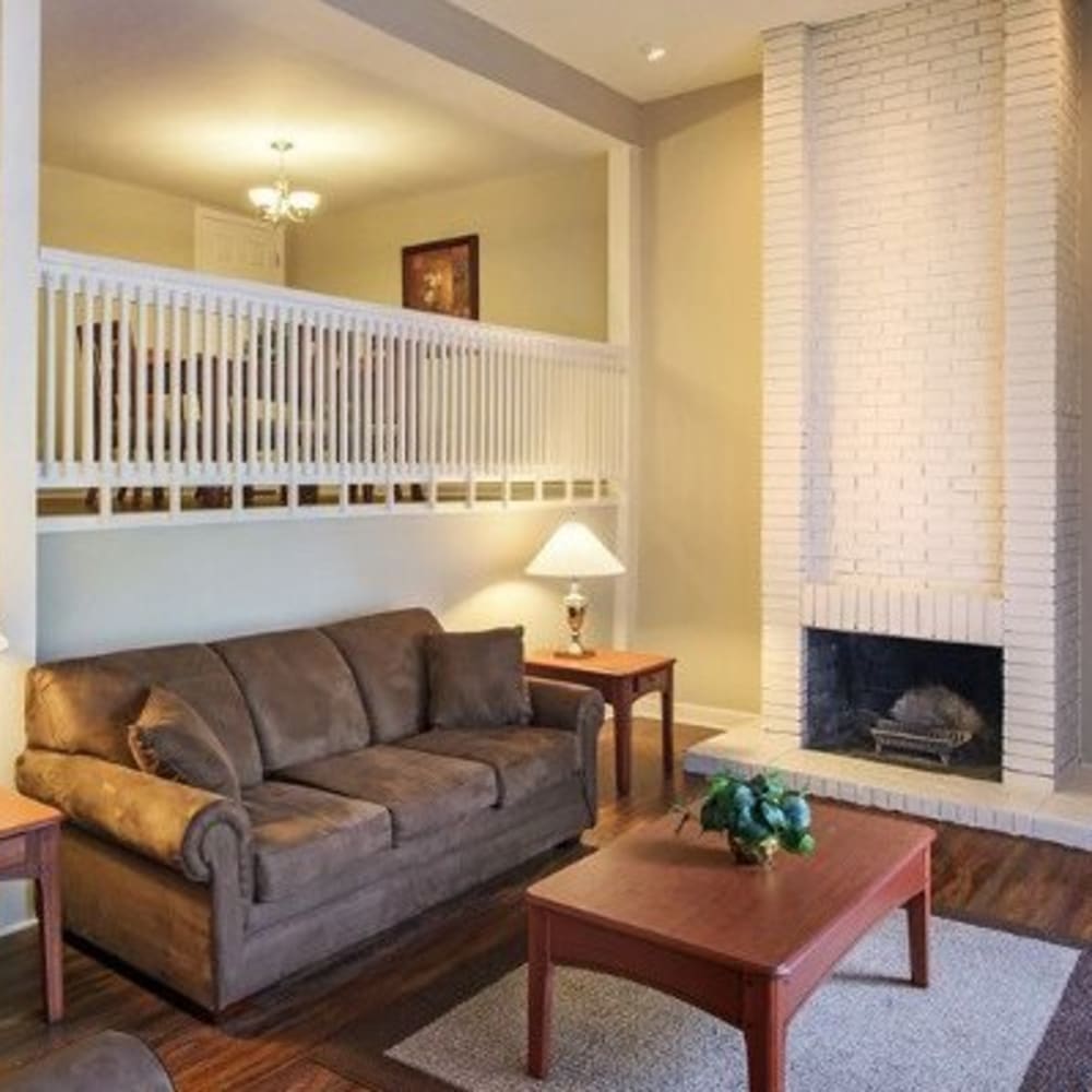 living room with fireplace at Nineteen North Apartments in Pittsburgh, Pennsylvania