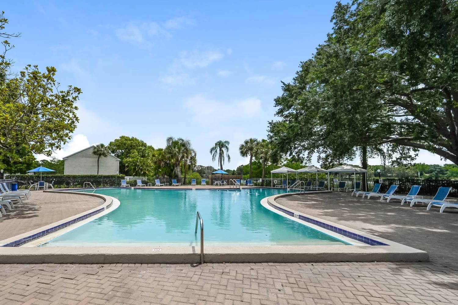 Resort-style swimming pool at Park at Lake Magdalene Apartments & Townhomes in Tampa, Florida