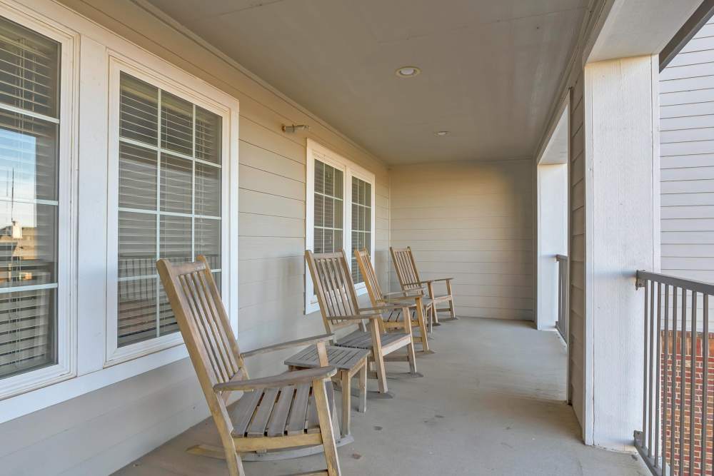 Spacious private balcony with chairs at River Ridge in Sand Springs, Oklahoma