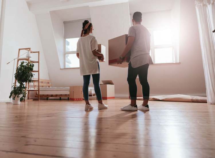 Residents carrying boxes to move into 270 Huntington in Boston, Massachusetts