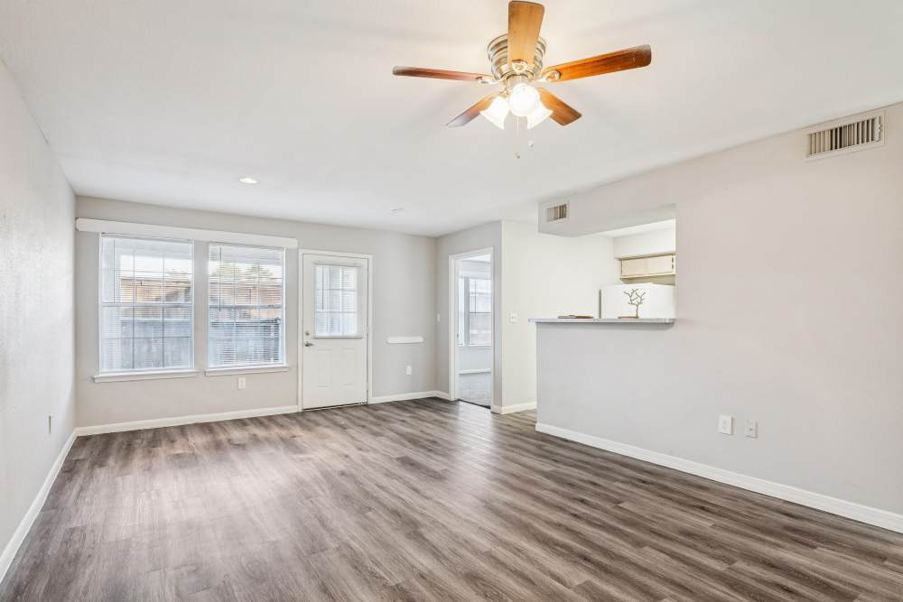Spacious living area with natural light and modern finishes at Scott Street Townhomes in Houston, Texas.