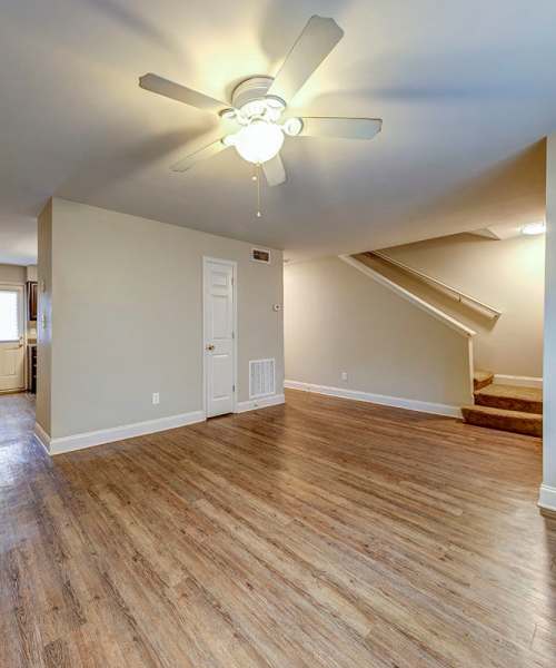 Spacious living area of townhome with stairs to first floor at Stanton Oaks in Atlanta, Georgia