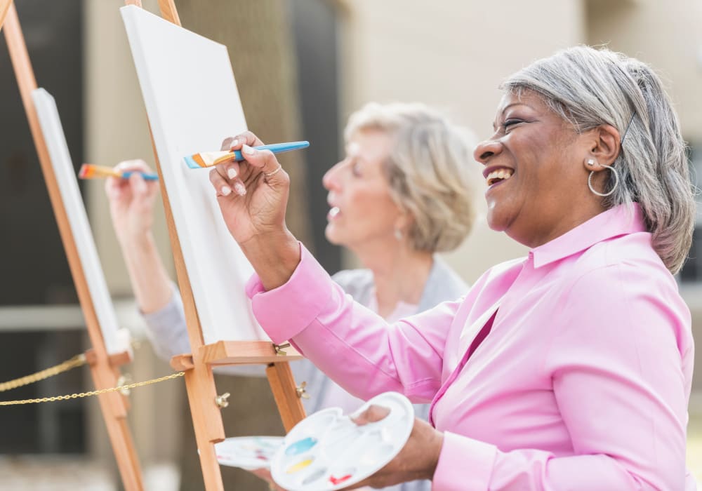 Residents painting together at Holden of Bellevue in Bellevue, Washington.
