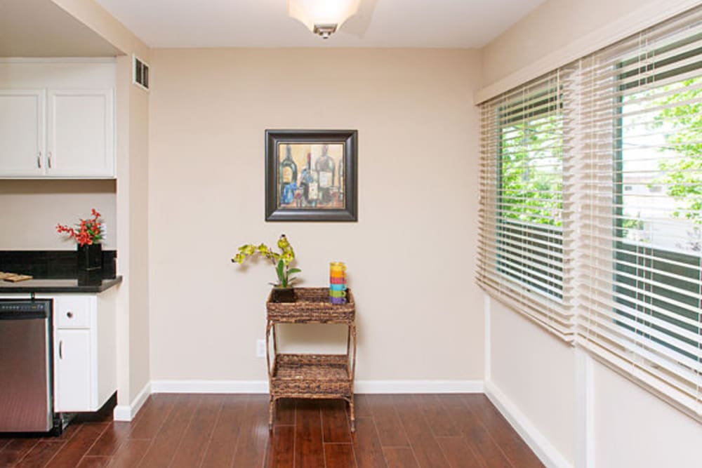 little cart in dining space with wood floors at Alta off the Avenue in Burlingame, California