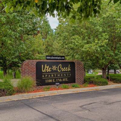 Front entrance sign at UTE Creek Apartments in Longmont, Colorado