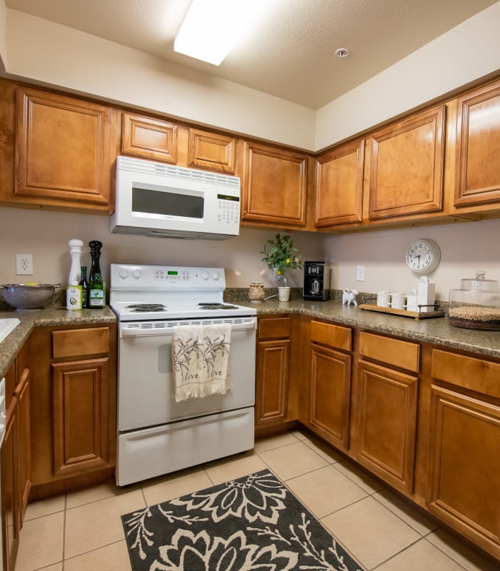 Kitchen with granite countertops at Remington Apartments in Amarillo, Texas