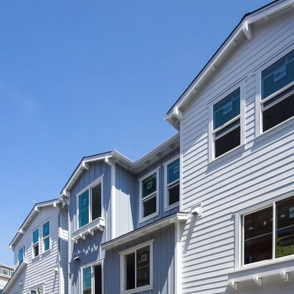 Exterior view of townhomes at Tower24 Ponto Beach in Carlsbad, California